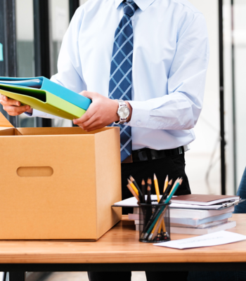 man packing box in commercial move